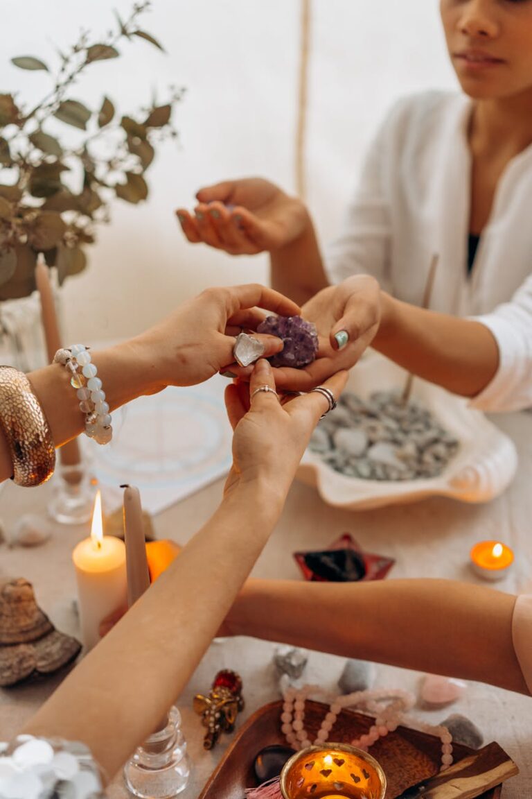 a person handing a stone to a woman. ritual